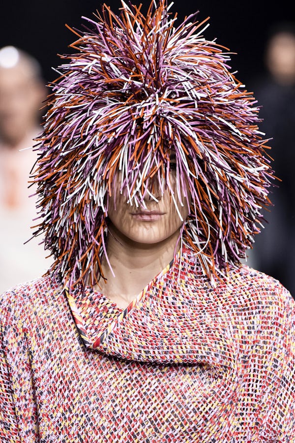 Colorful lion’s mane-esque wigs were spotted at Milan Fashion Week S/S 2025.