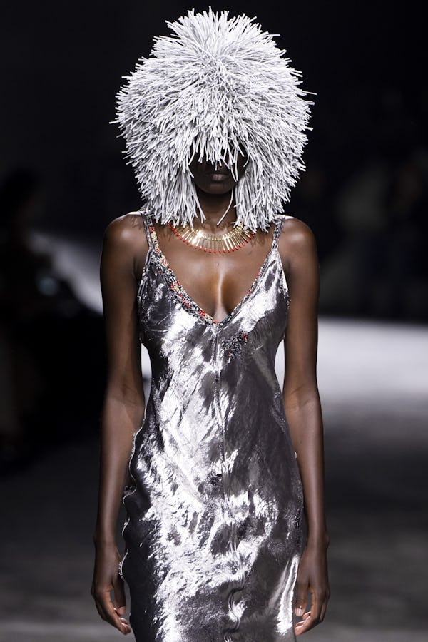 Colorful lion’s mane-esque wigs were spotted at Milan Fashion Week S/S 2025.