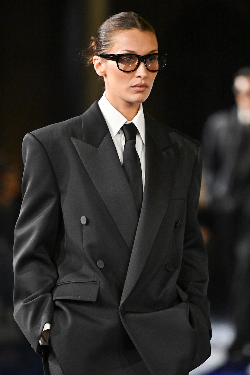 Bella Hadid walks the runway during the Saint Laurent Womenswear Spring-Summer 2025 show as part of ...