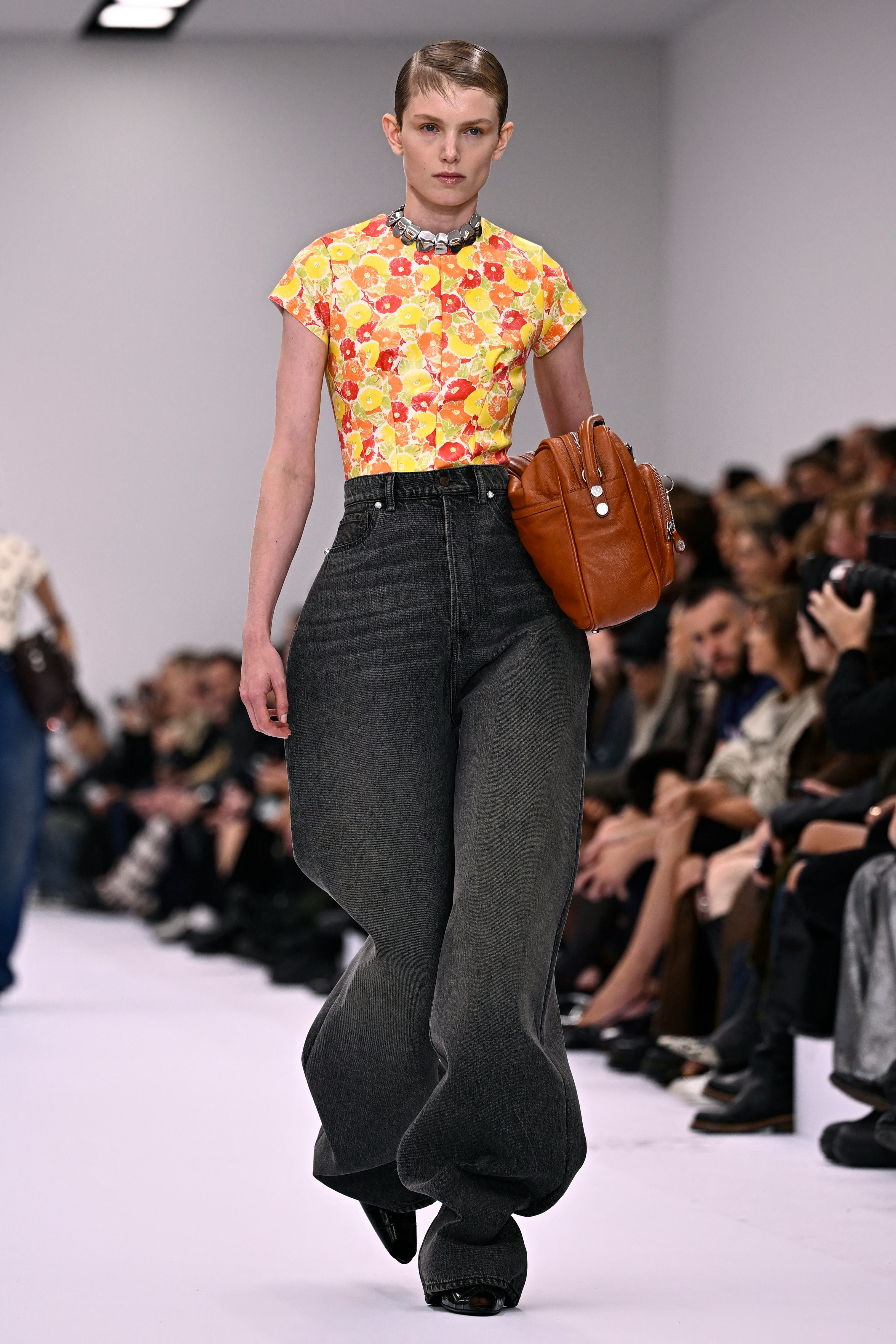 A model presents a creation by Acne Studios for the Women Ready-to-wear Spring-Summer 2025 collectio&hellip;