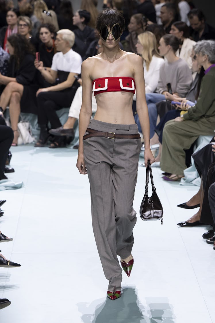 MILAN, ITALY - SEPTEMBER 19: A model walks the runway during the Prada Ready to Wear Spring Summer 2...