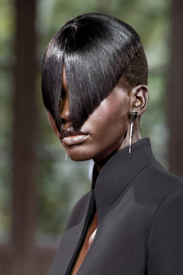 Edgy cut-out bangs were spotted at Paris Fashion Week Spring/Summer 2025.