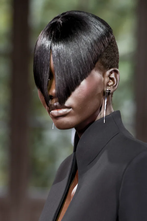 Edgy cut-out bangs were spotted at Paris Fashion Week Spring/Summer 2025.