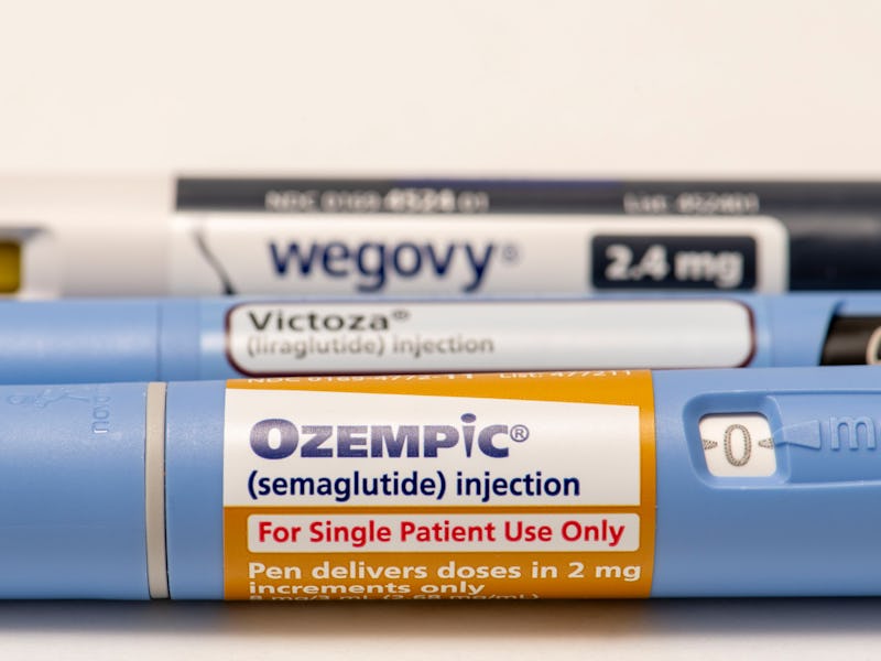 Still life closeup of the big three injectable prescription weight loss medicines. Ozempic, Victoza ...