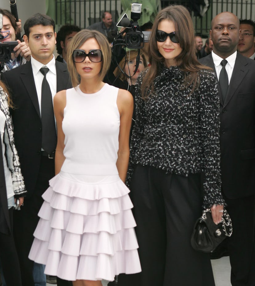 Victoria Beckham and Katie Holmes (Photo by Toni Anne Barson/WireImage)