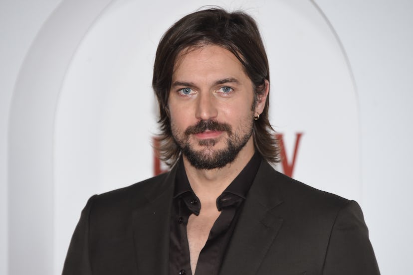 Lucas Bravo on the red carpet of Netflix series ‘Emily in Paris’