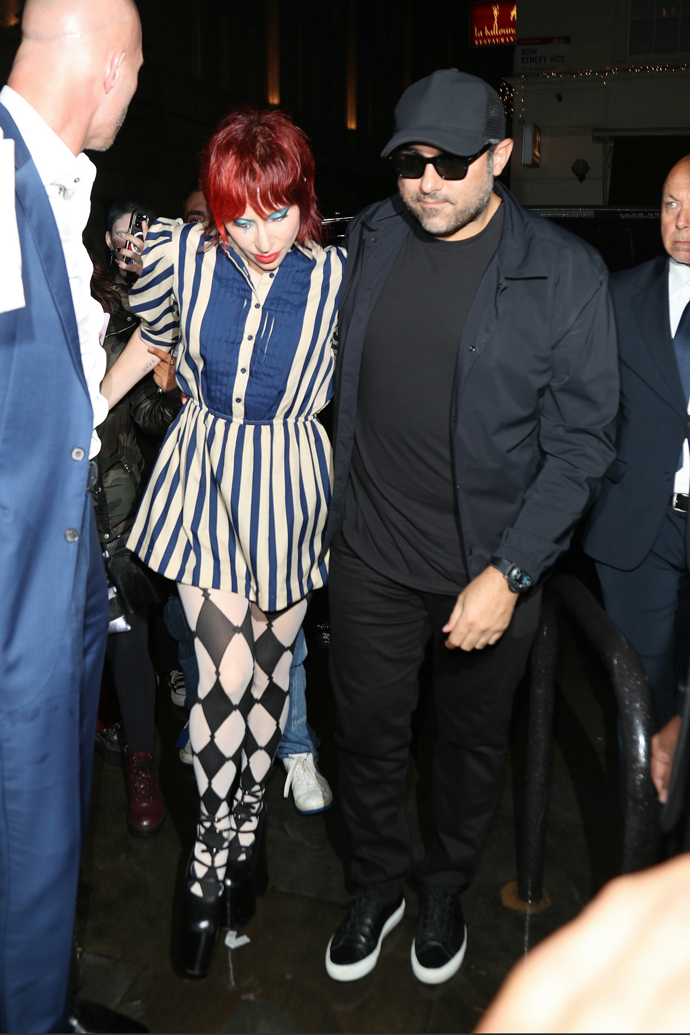 LONDON, ENGLAND - SEPTEMBER 25: Lady Gaga wore checkered black tights with Michael Polansky arriving&hellip;