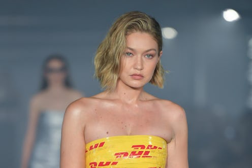 Gigi Hadid Wore Packing Tape As A Dress At Paris Fashion Week while walking the Vetements Show