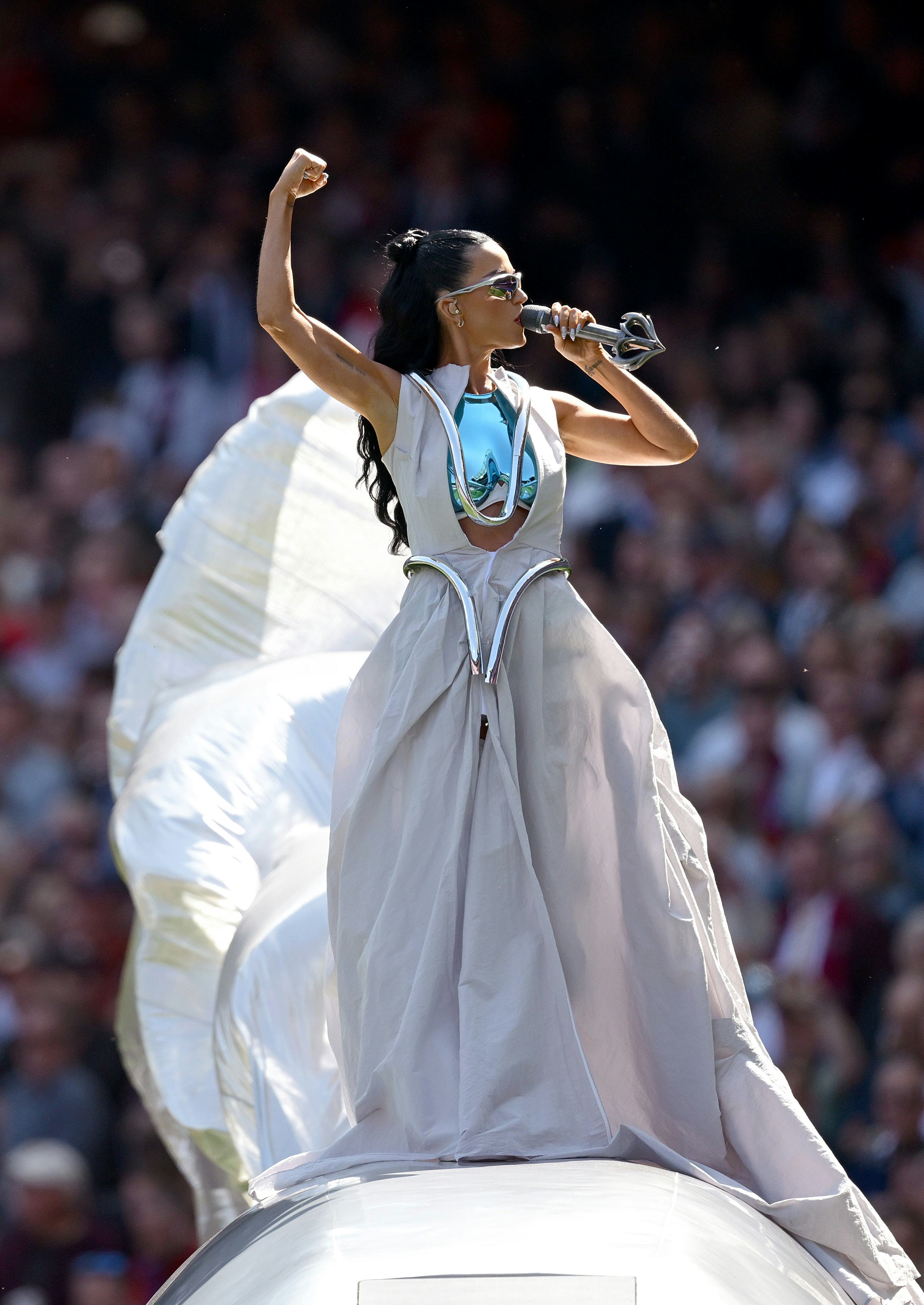 Katy Perry wore a brest plate at the AFL Grand Final cricket match in Australia.