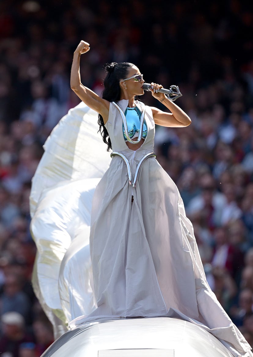 Katy Perry wore a brest plate at the AFL Grand Final cricket match in Australia.