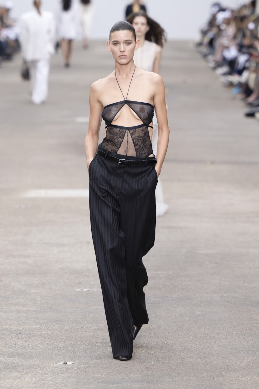 A model walks the runway during the Stella McCartney Ready to Wear Spring/Summer 2025 fashion show a...