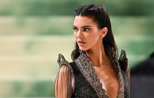 Kendall Jenner wore a lace bra as a top in a Calvin Klein shoot.