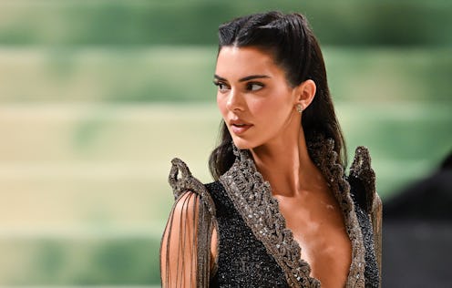 Kendall Jenner wore a lace bra as a top in a Calvin Klein shoot.