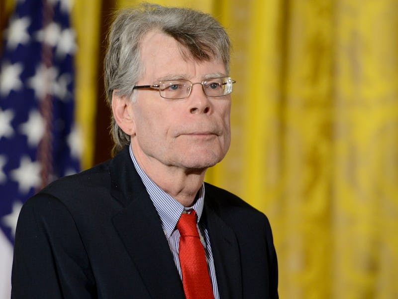 WASHINGTON, DC - SEPTEMBER 10: President Barack Obama presents author Stephen King with the 2014 Na...
