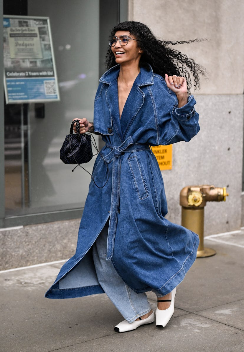 NEW YORK, NEW YORK - SEPTEMBER 07: Sophia Roe is seen wearing a Nanushka denim trench coat outside t...