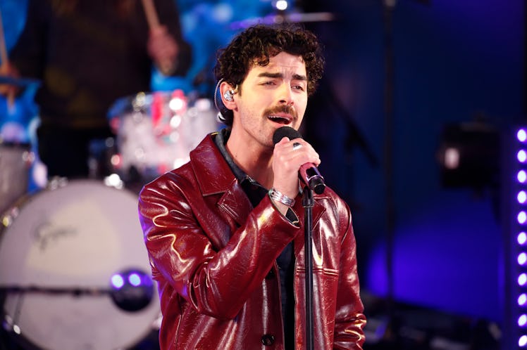NEW YORK, NEW YORK - DECEMBER 31: Joe Jonas of The Jonas Brothers performs during Times Square New Y...