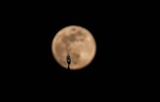 The first full moon of 2025, also known as the Wolf Moon, rises in Srinagar, Kashmir, India, on Janu...