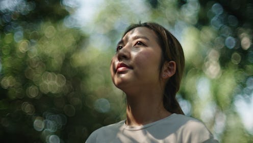 Asian young woman relax resting at nature.