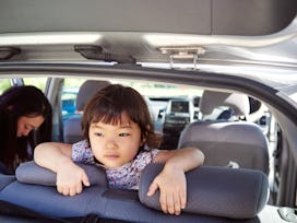 The girl is 3 years old. I'm waiting in the car to be ready.