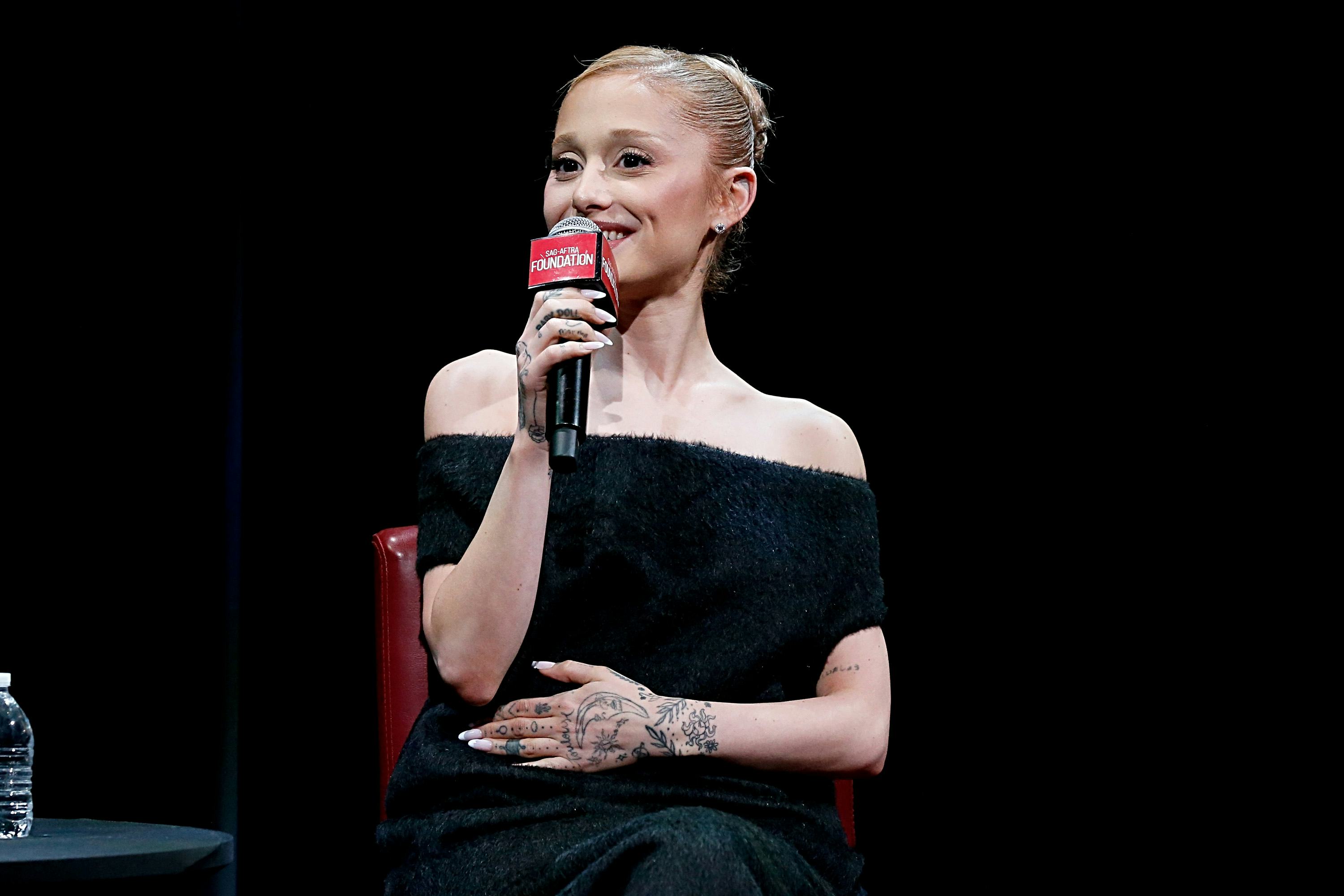 Ariana Grande talks about playing Glinda in Wicked at a film screening.