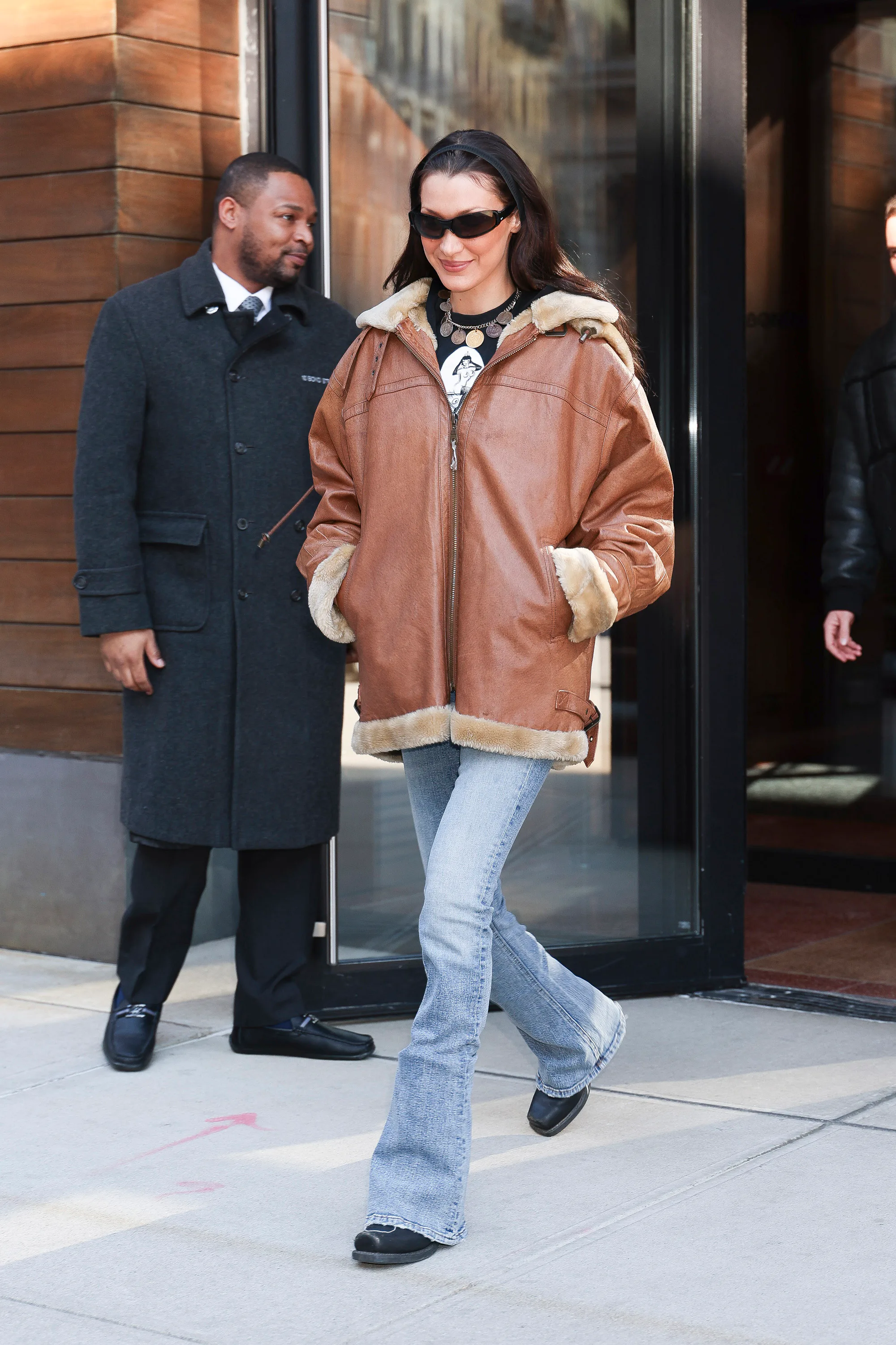Bella Hadid Pairs a '70s Jeans Trend With a Penny Lane Coat and