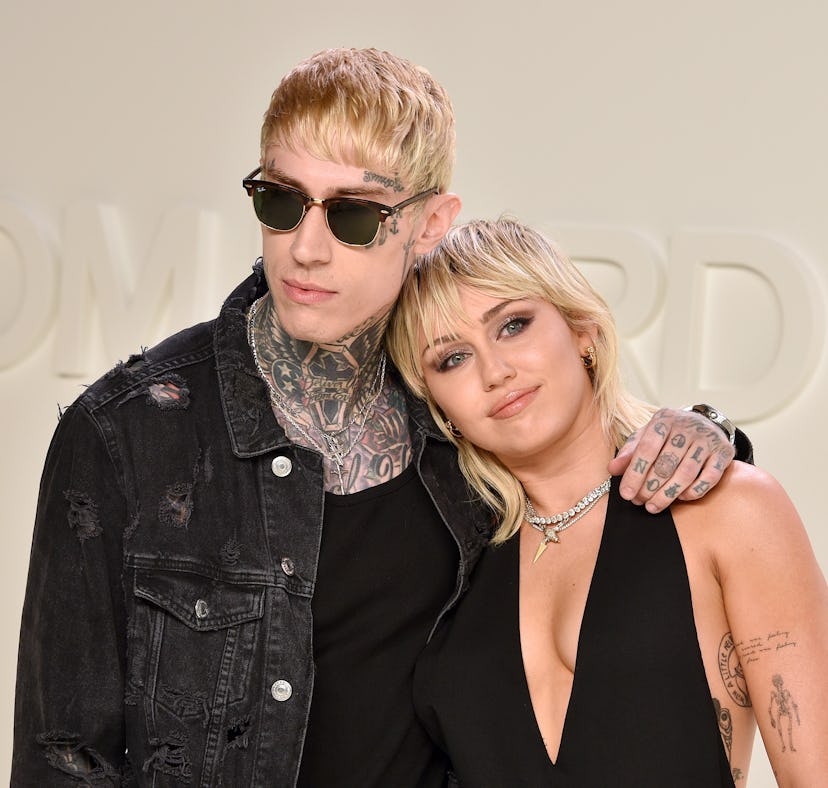 LOS ANGELES, CALIFORNIA - FEBRUARY 07: Trace Cyrus and Miley Cyrus attend the Tom Ford AW/20 Fashion...
