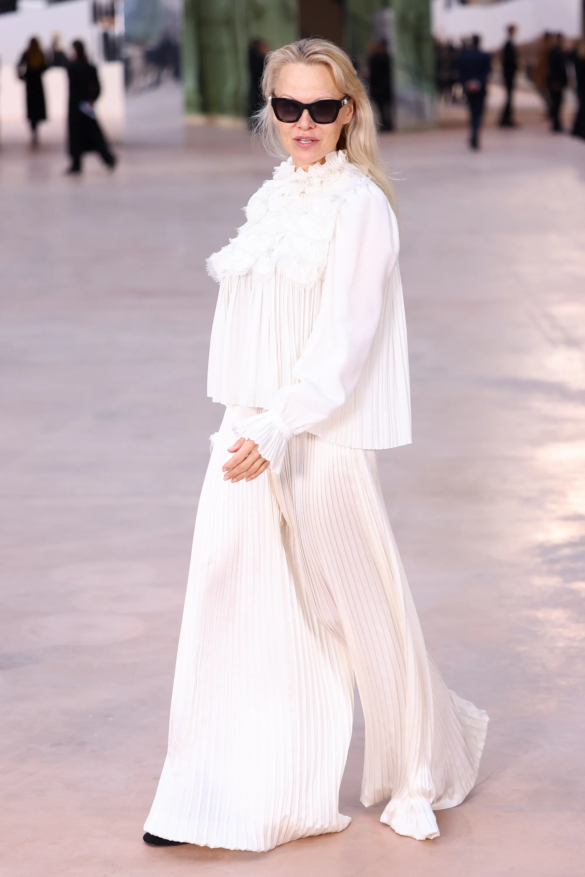 A Guide to Pamela Anderson's Fashion From Paris Couture Week
