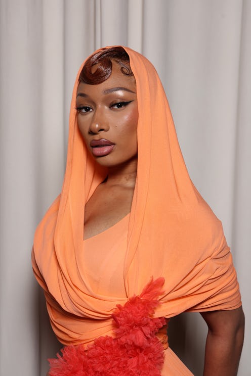 Megan Thee Stallion basically wore body jewelry to Paris Couture Week.