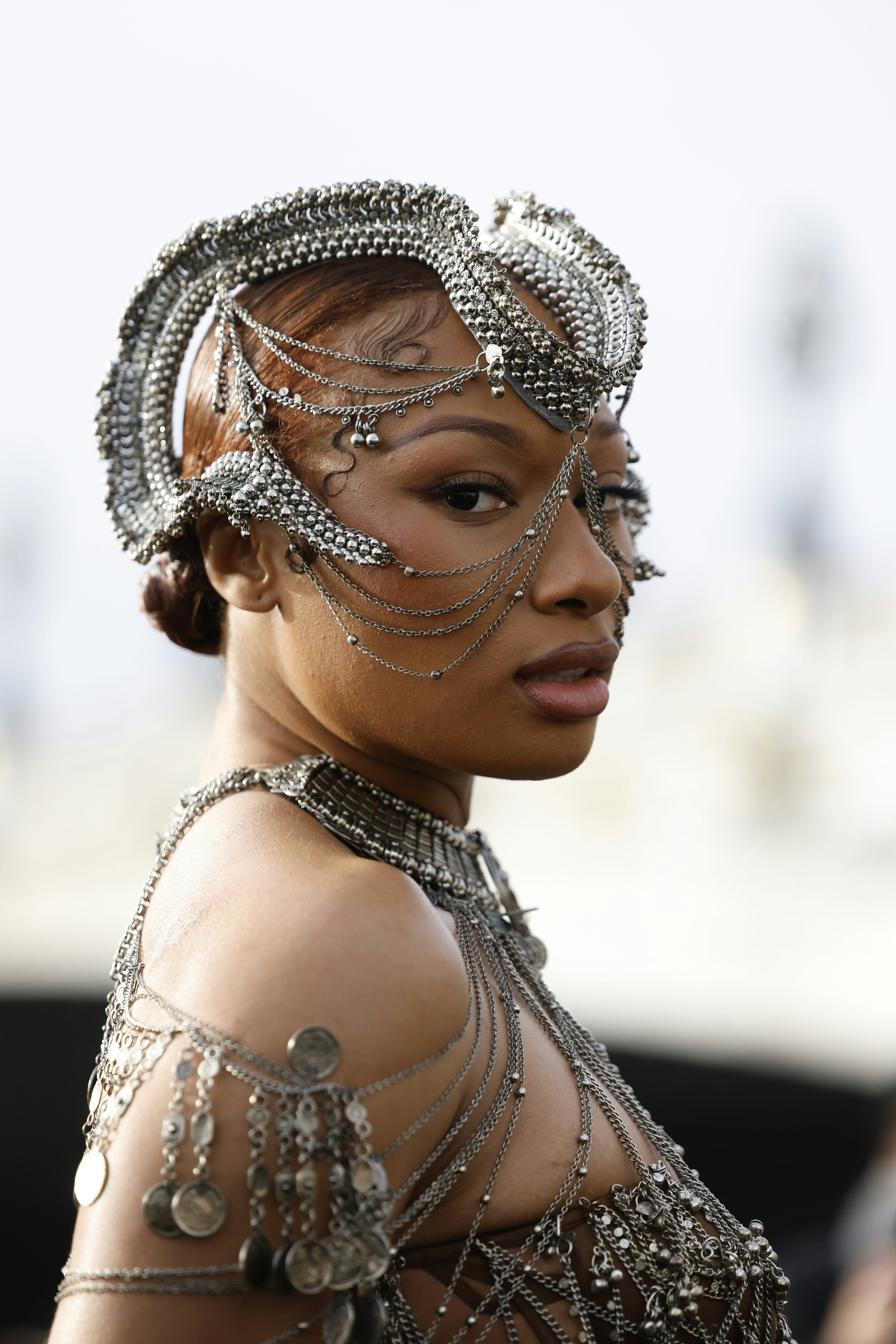 Megan Thee Stallion basically wore body jewelry to Paris Couture Week.