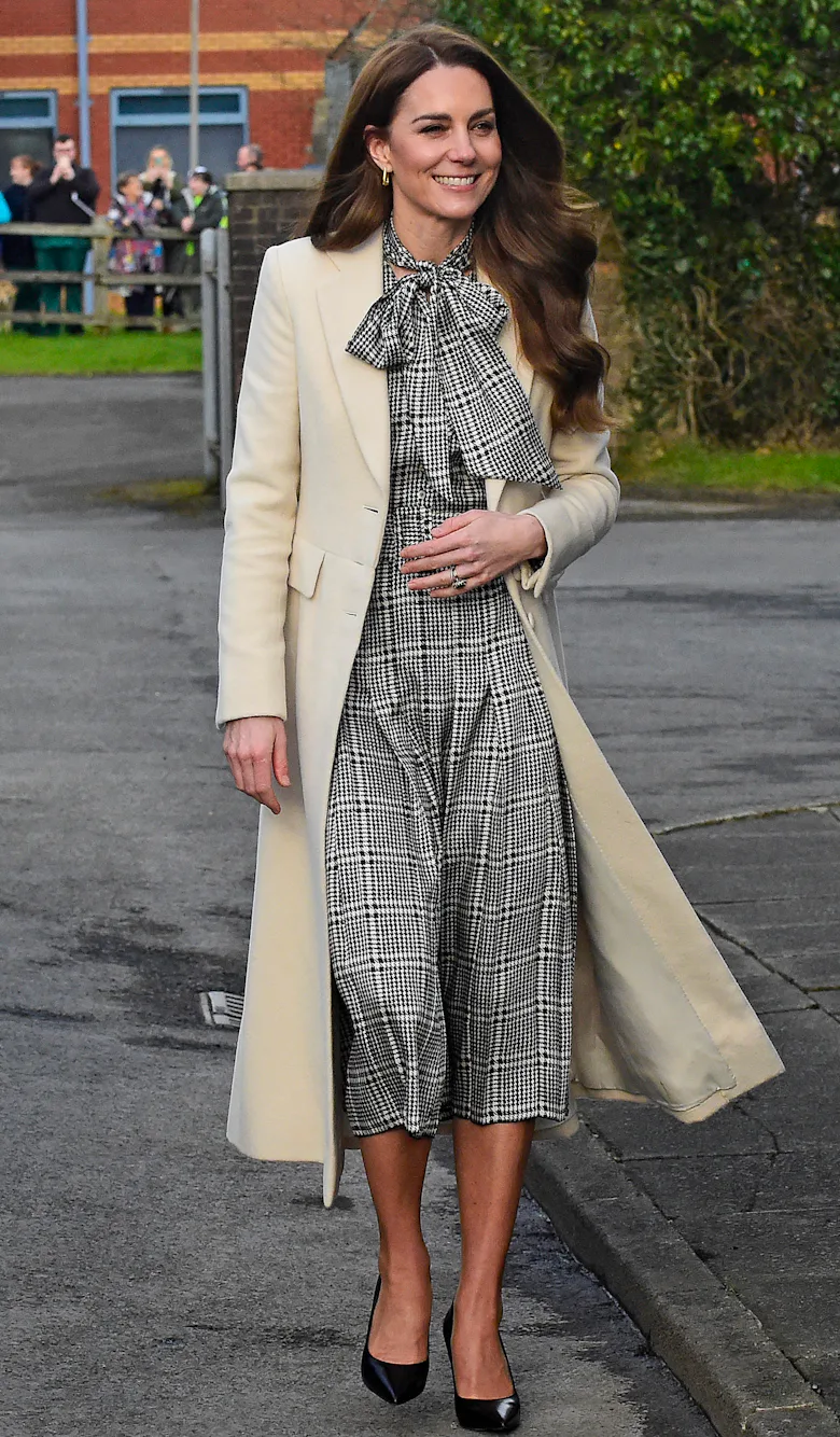 Kate Middleton Re-wears Her Mall Brand Dress With a Bespoke Ivory Coat Kate Middleton Re-wears Her Mall Brand Dress With a Bespoke Ivory Coat