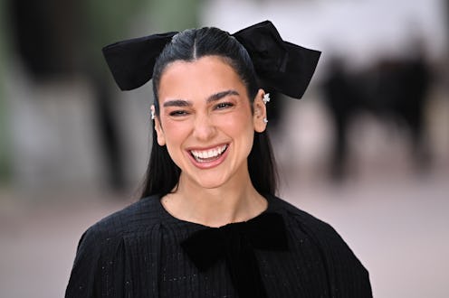 Dua Lipa exposed her undies in a sheer LBD.