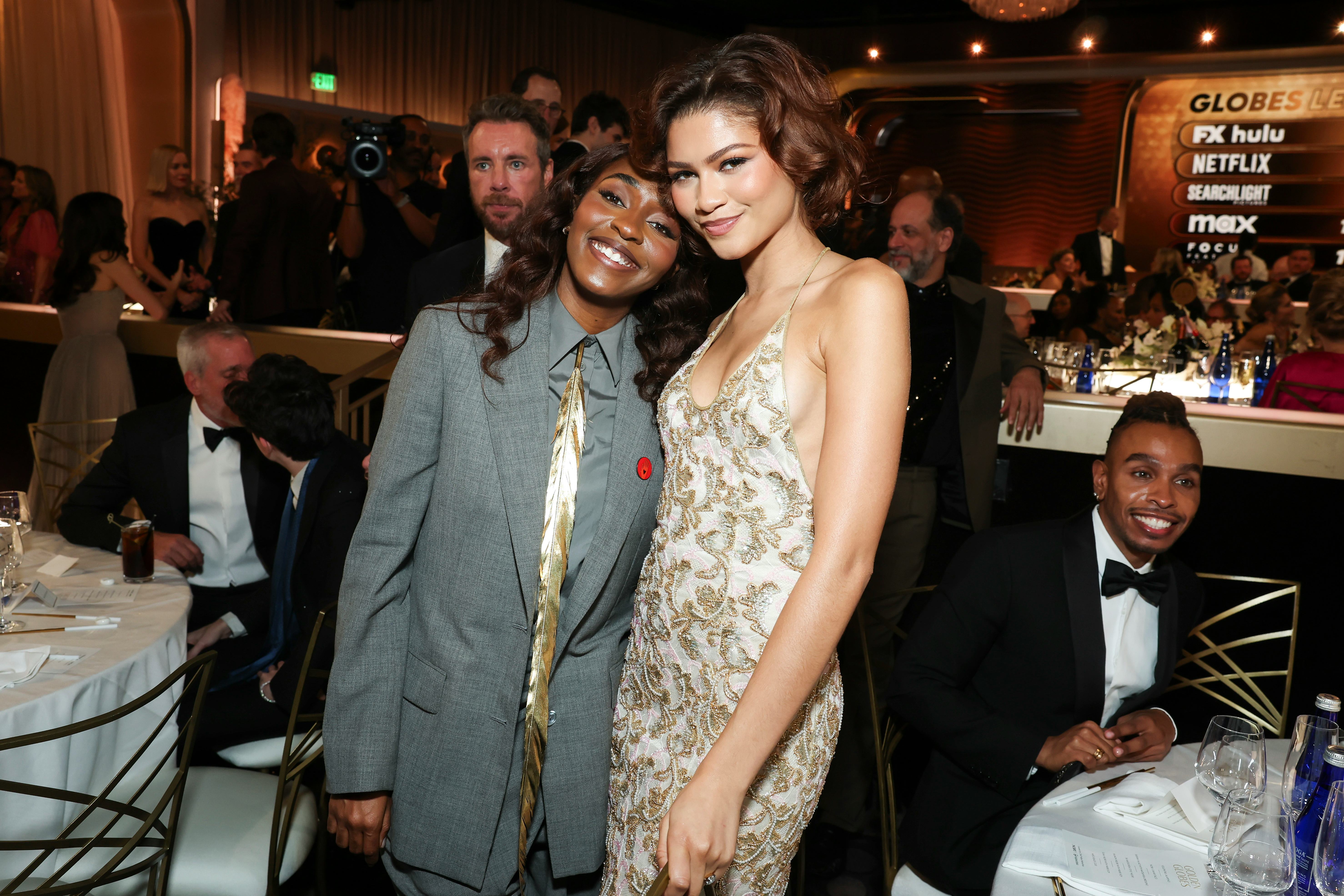 Ayo Edebiri and Zendaya attend the 82nd Annual Golden Globe Awards