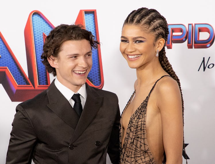 LOS ANGELES, CALIFORNIA - DECEMBER 13: (L-R) Tom Holland and Zendaya attendsthe Los Angeles premiere...