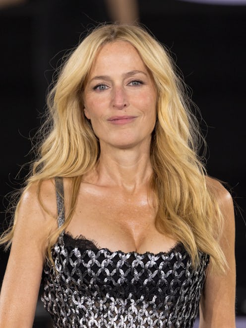 Gillian Anderson walks the runway during the Le Défilé L'Oréal Paris fashion show