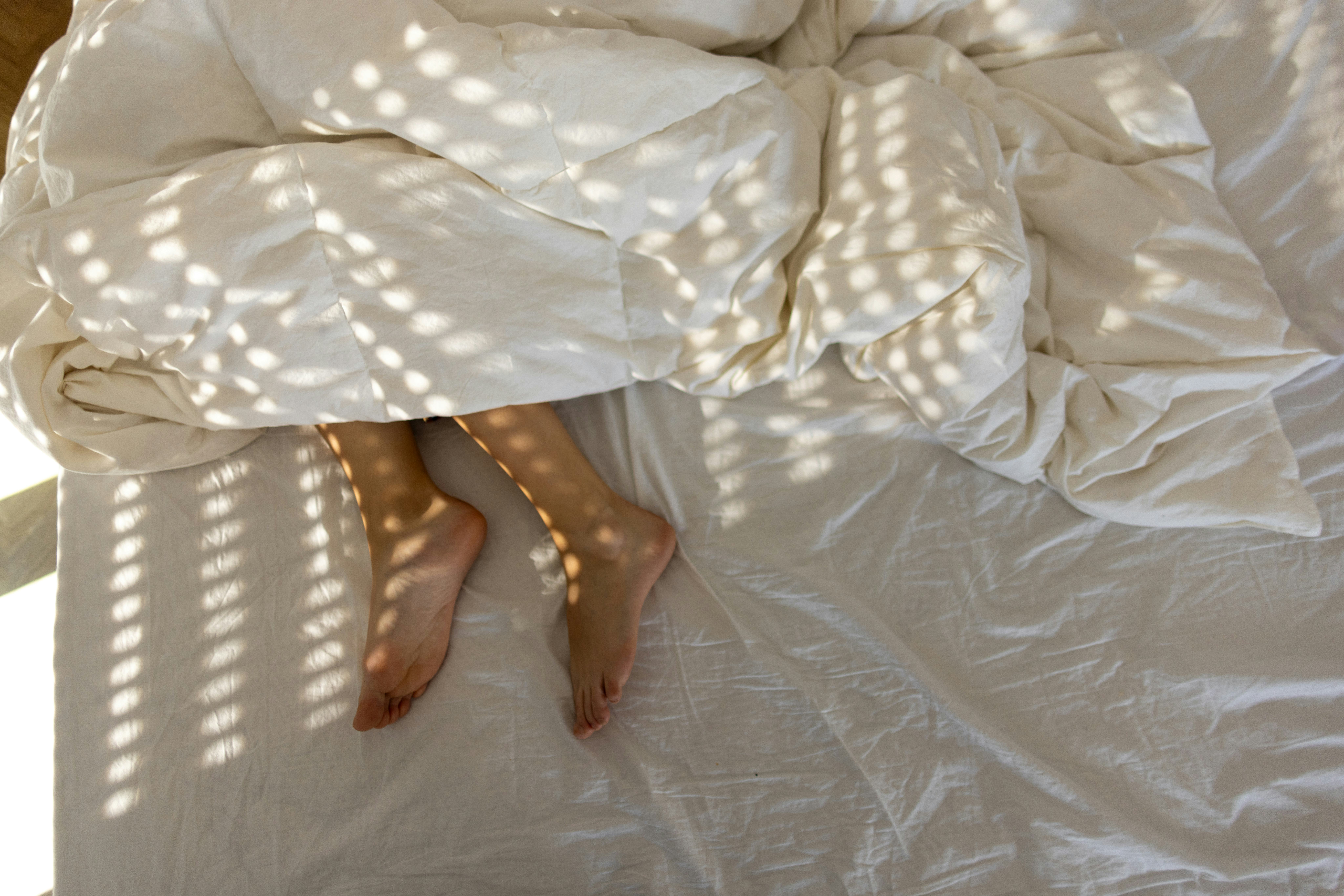 The Scientific Reason You Love Sleeping With One Foot Outside Of The Sheets