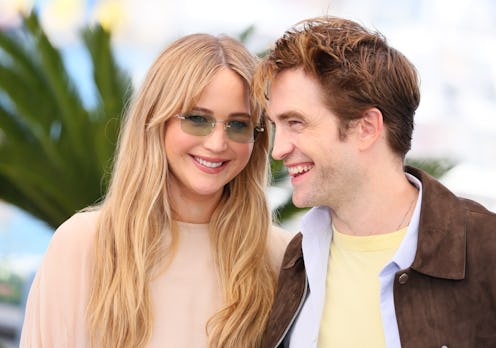 CANNES, FRANCE - MAY 18: Jennifer Lawrence and Robert Pattinson pose during the Die My Love photocal...