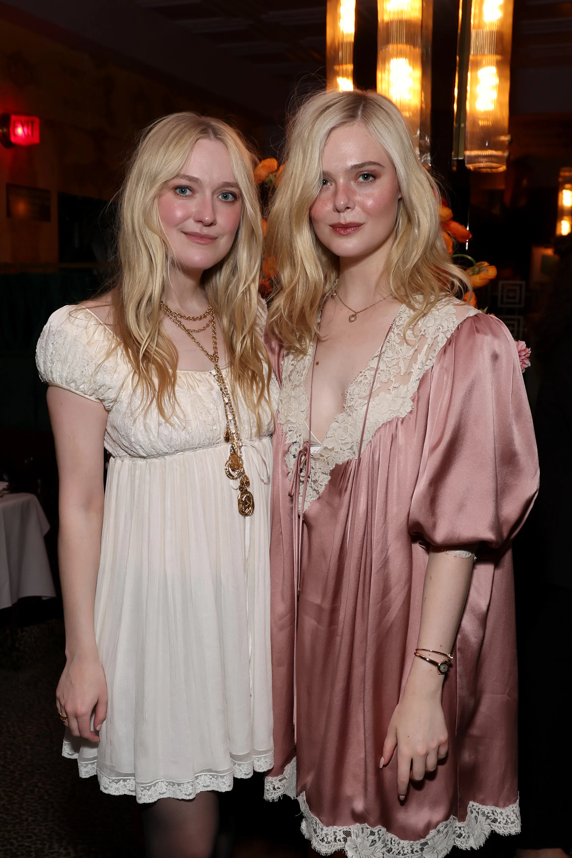 BEVERLY HILLS, CALIFORNIA - OCTOBER 17: (L-R) Dakota Fanning and Elle Fanning attend an Intimate Din...
