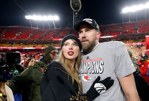 KANSAS CITY, MISSOURI - JANUARY 26: Taylor Swift celebrates with Travis Kelce #87 of the Kansas City...