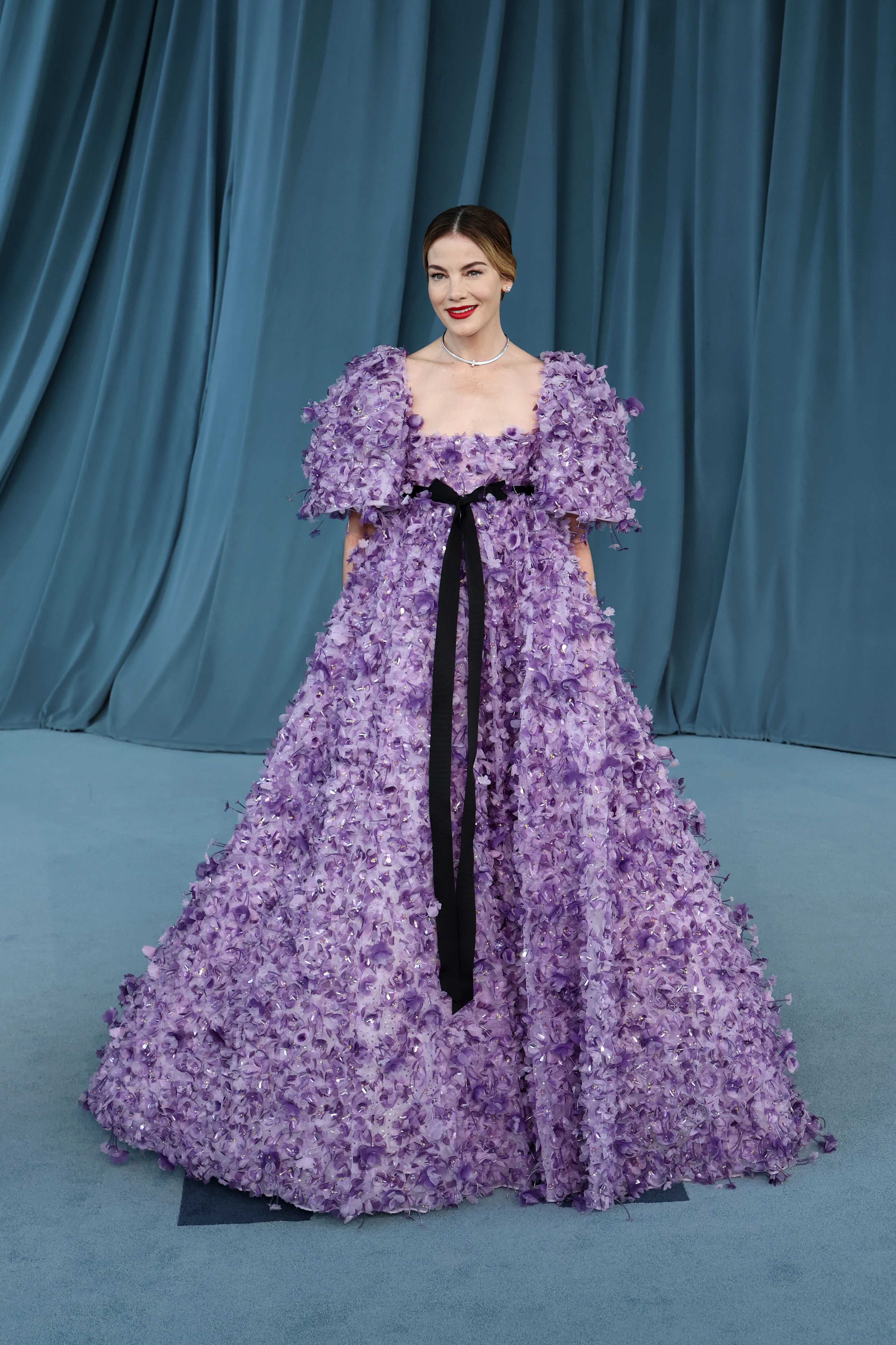 met gala 2025 purple dress Natasha Poonawalla (@natasha.poonawalla) attends the Met Gala 2025 in  custom Manish Malhotra couture (@manishmalhotraworld), offering a  considered interpretation of the theme through Indian craftsmanship and  references to her Parsi heritage. Her look