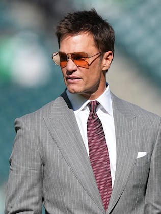 PHILADELPHIA, PENNSYLVANIA - OCTOBER 26: Fox sports announcer Tom Brady looks on prior to the game b...