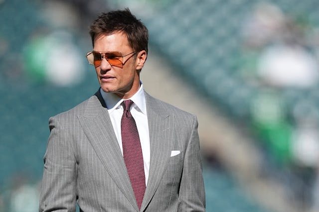PHILADELPHIA, PENNSYLVANIA - OCTOBER 26: Fox sports announcer Tom Brady looks on prior to the game b...