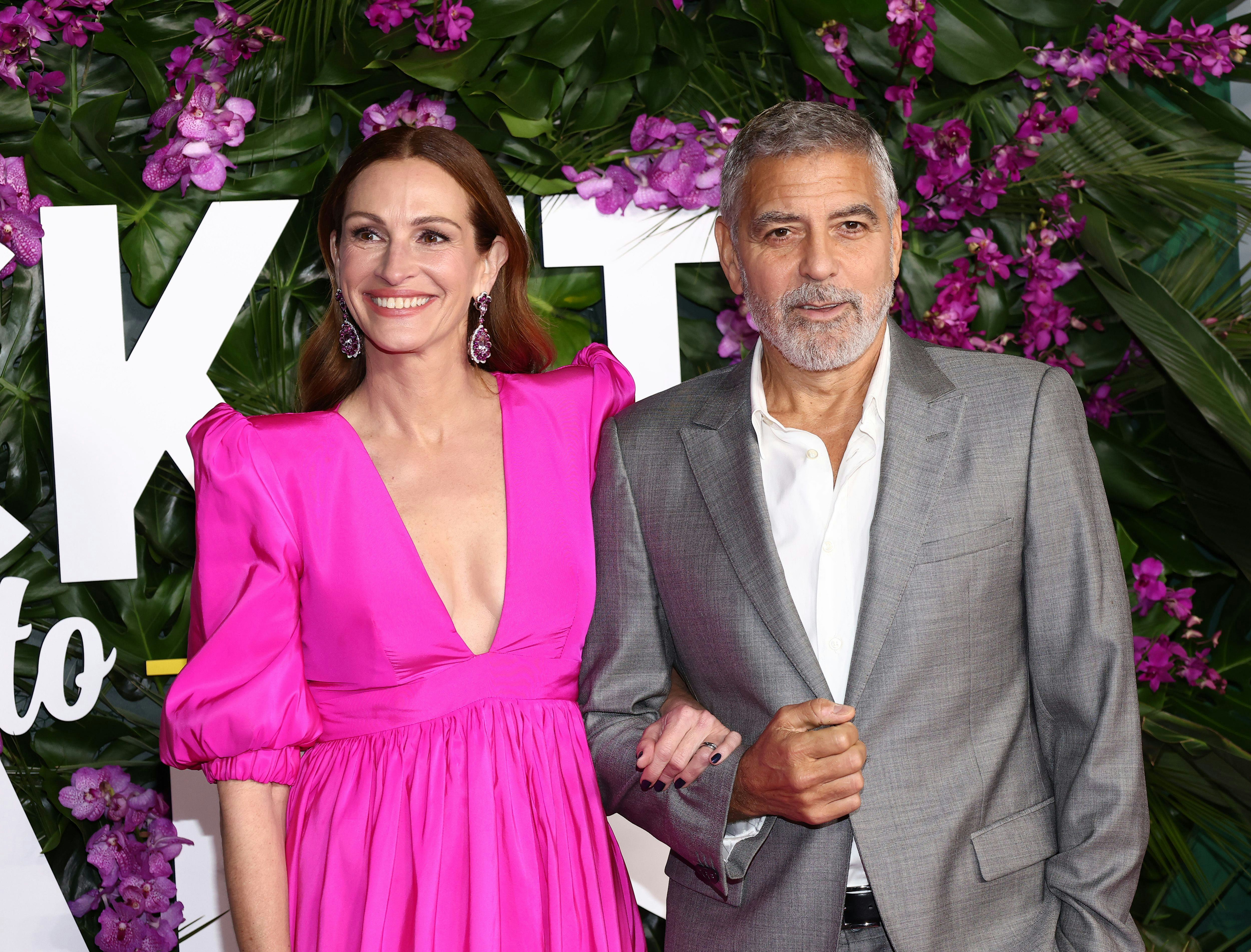 Julia Roberts and George Clooney attend the premiere of Universal Pictures' "Ticket To Paradise" at ...