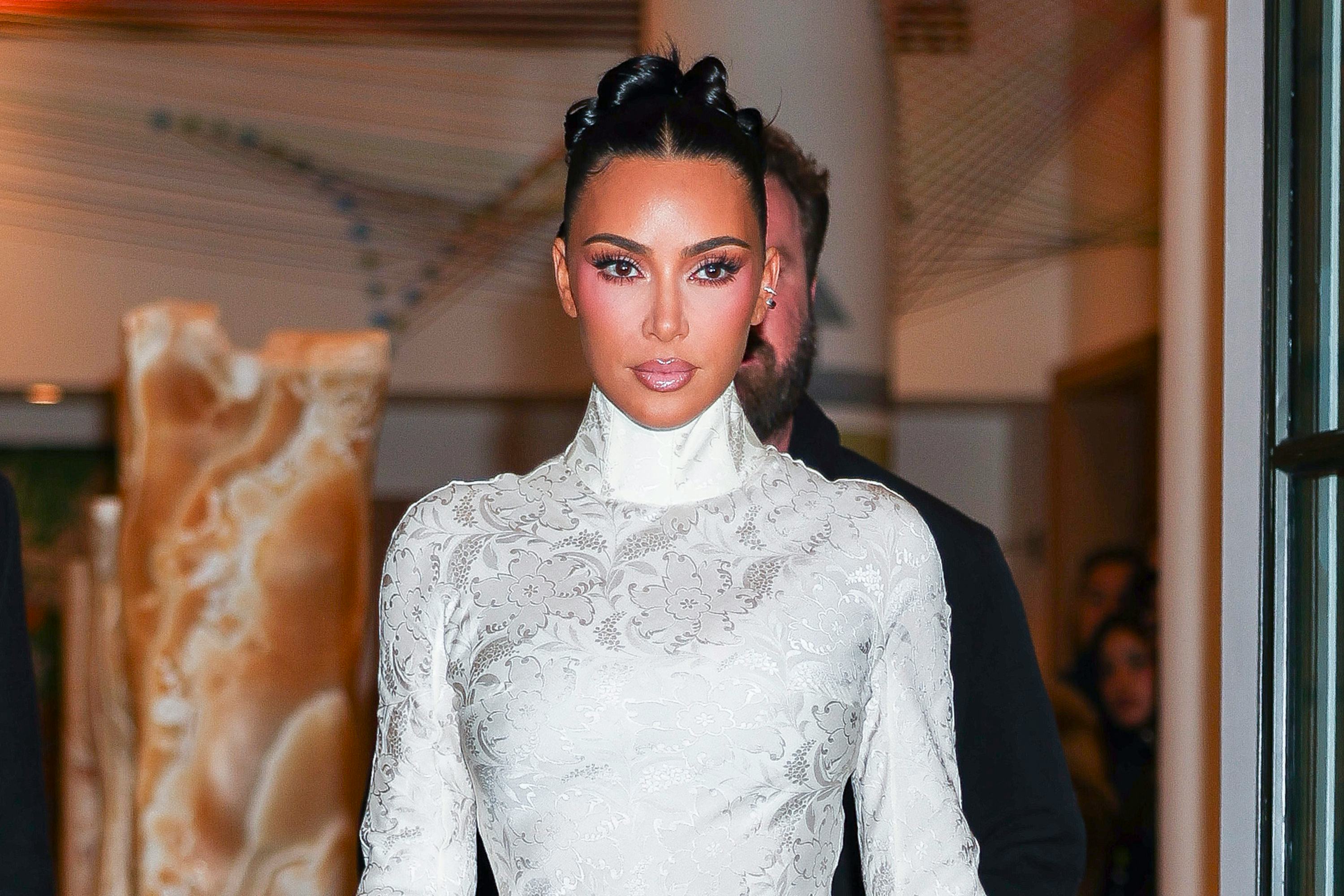 Kim Kardashian called out psychics for telling her she's pass the bar exam.
