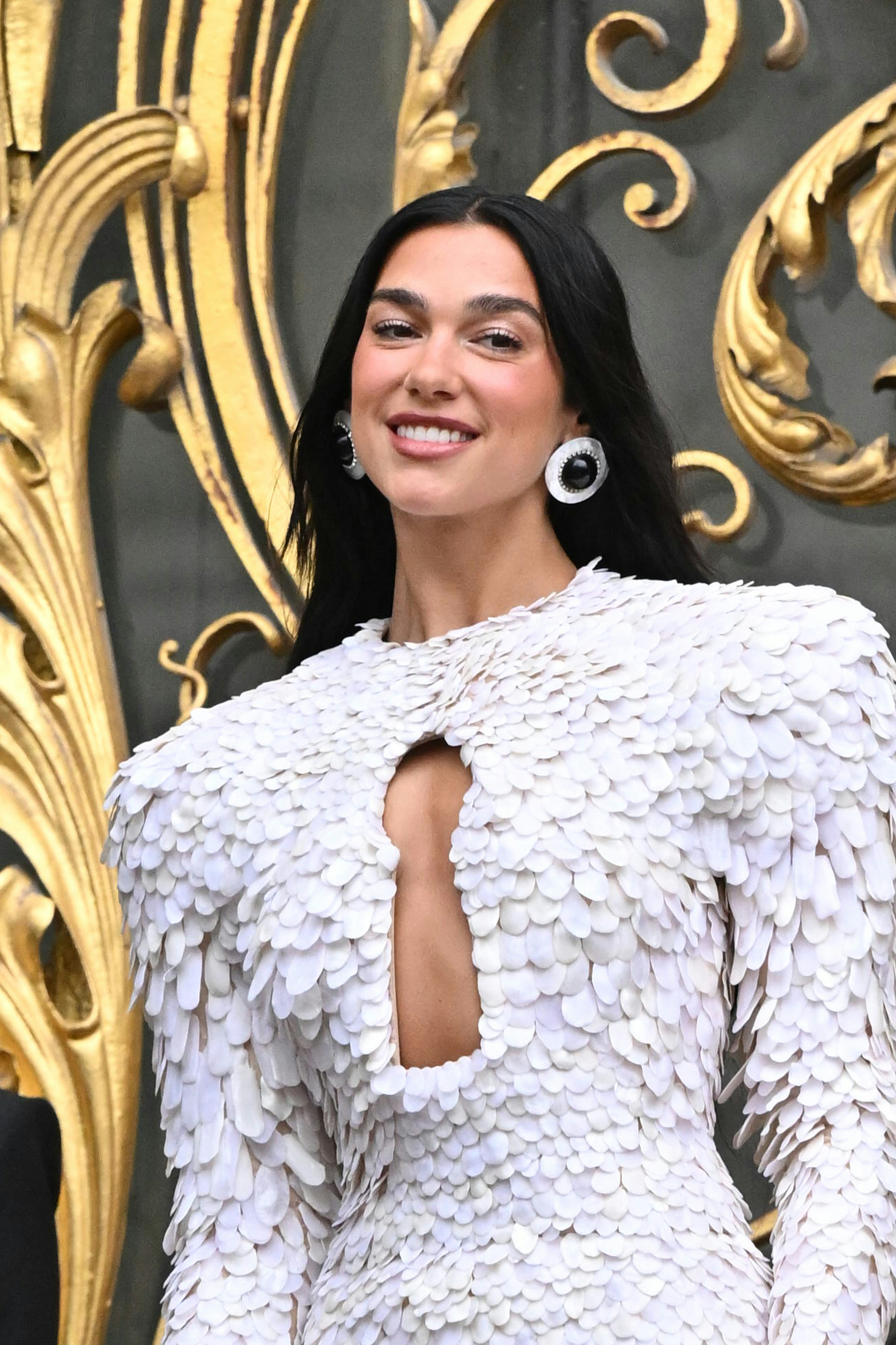 Dua Lipa Paired A Lacy Corset With 1 Of Fall 2025's Fave Animal Print Bags