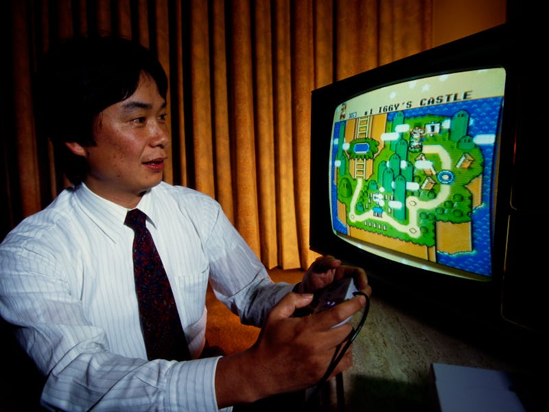 Shigeru Miyamoto, creator of Mario and other characters and video games for Nintendo, plays Super Ma...