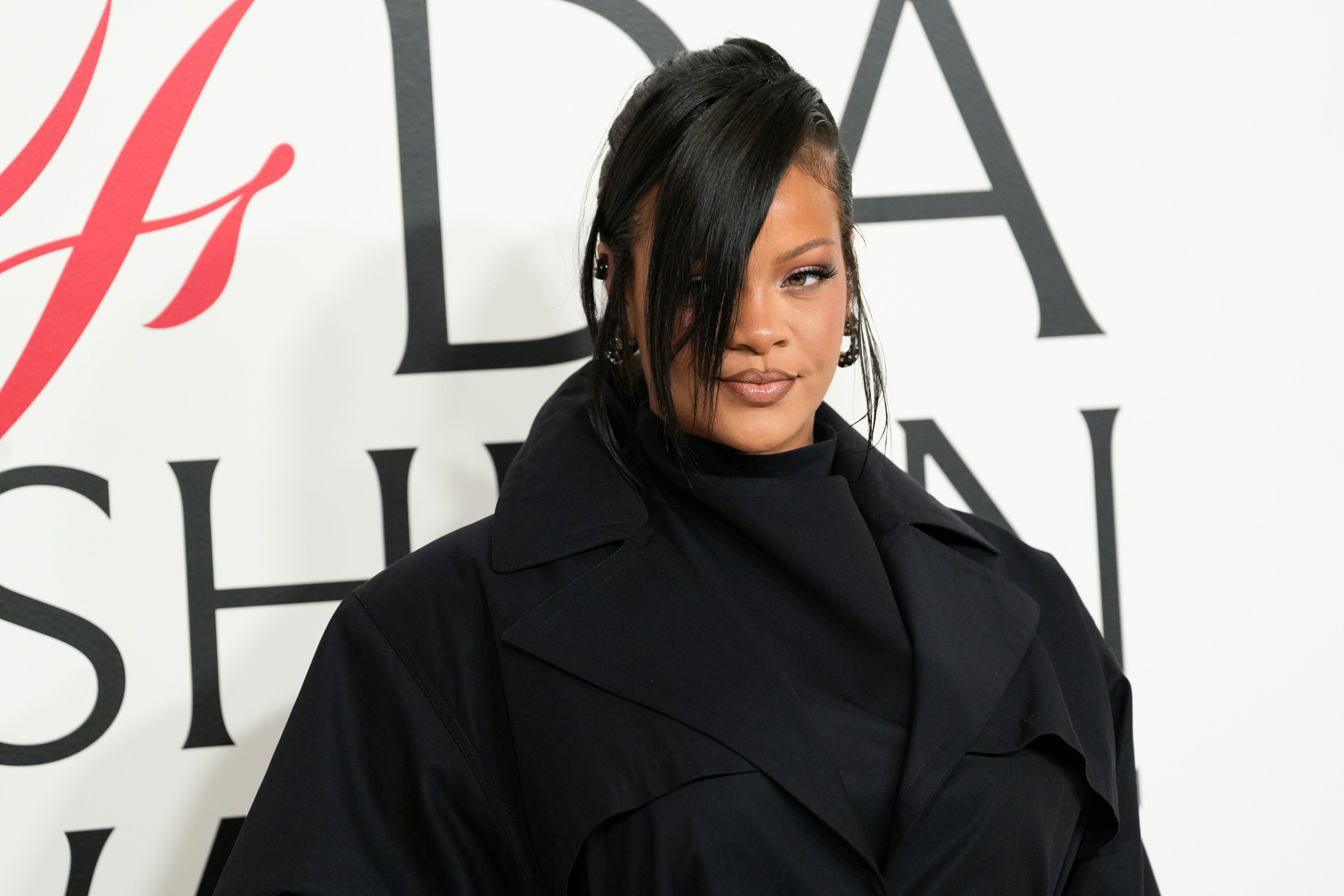 Rihanna Embraced The See-Through Trend With A Slitted Jacket