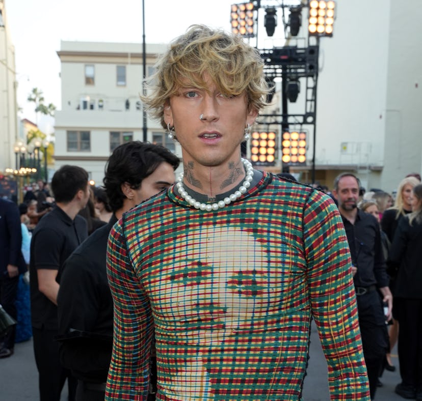 Machine Gun Kelly compares his sex life to F1 drivers.