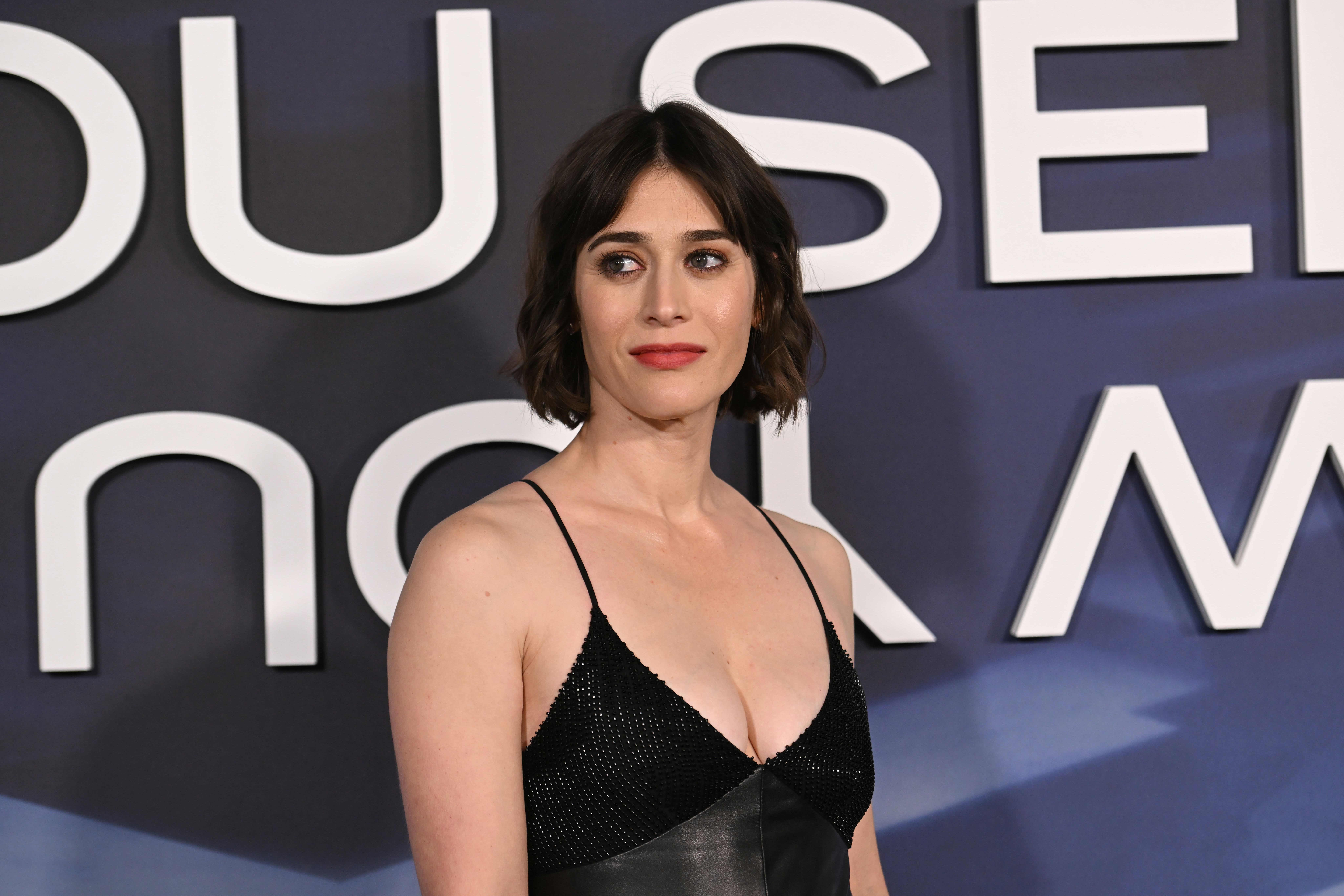 NEW YORK, NEW YORK - NOVEMBER 10: Lizzy Caplan attends Lionsgate's "Now You See Me: Now You Don't" N...