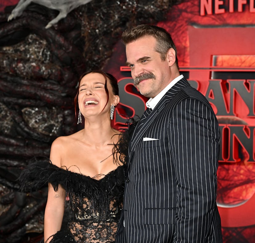 Millie Bobby Brown and David Harbour laughed off "bullying" rumors at the 'Stranger Things 5' premie...