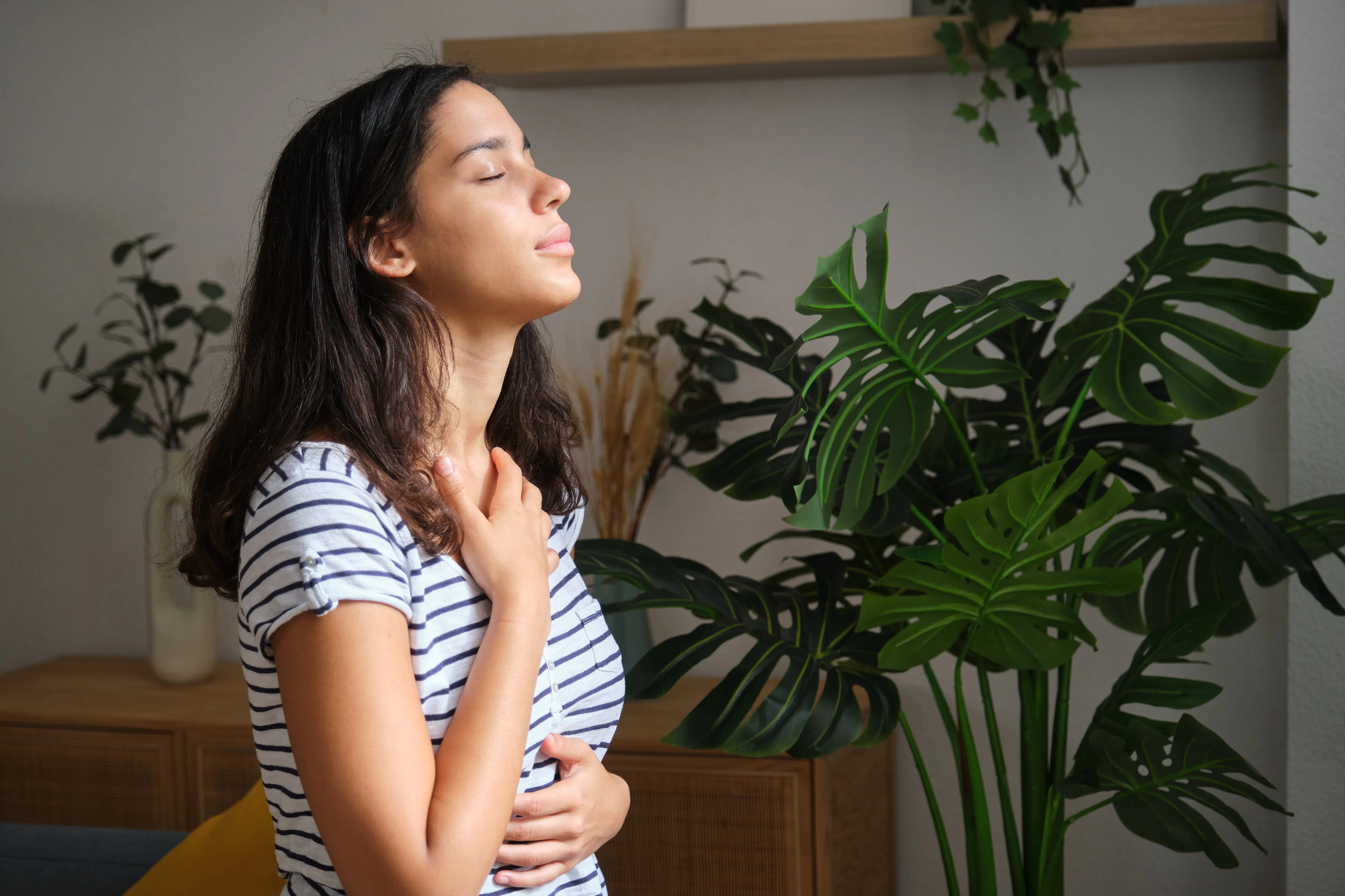 Doing reiki on yourself.